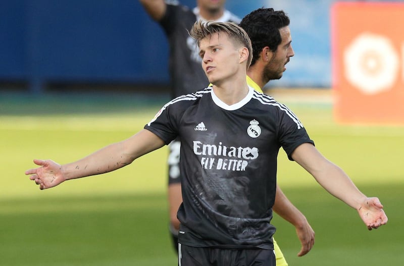 Martin Odegaard in a rare appearance for Real Madrid last November. Reuters