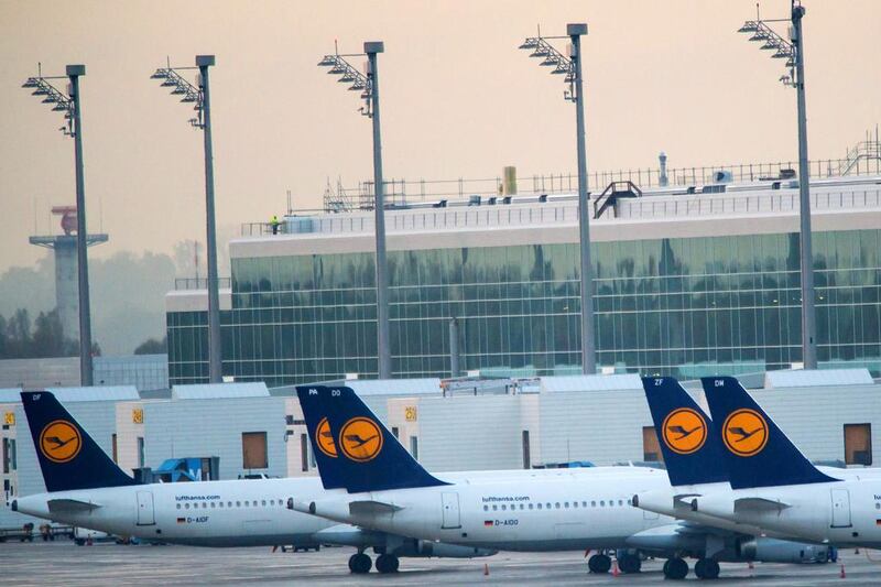 Lufthansa aircraft parked at the gates of the airport in Munich. The strike is the eighth this year by the Cockpit Union, which is fighting to preserve an early-retirement scheme that allow pilots to leave after 55 on generous benefits. Lufthansa wants to raise the threshold to 60.  Peter Kneffel / EPA