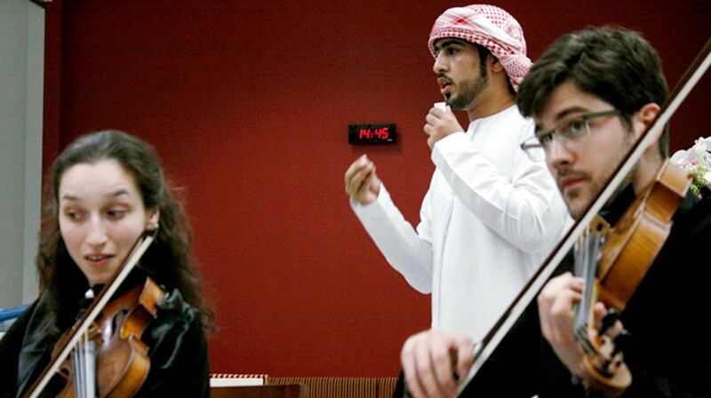 Emirati poet - in red head covering, Abdulrahman Glaladdin Mohammed Jadrani
CREDIT: Courtesy Chamber Music Abu Dhabi