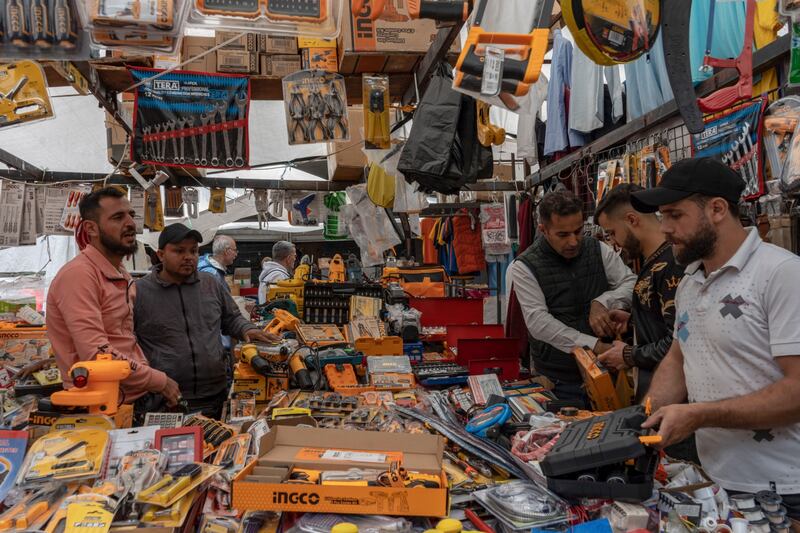 Shoppers at a tool stall in the Al Ahad market in Beirut. Lebanon's financial crisis is one of the world's worst since the 19th century. Bloomberg