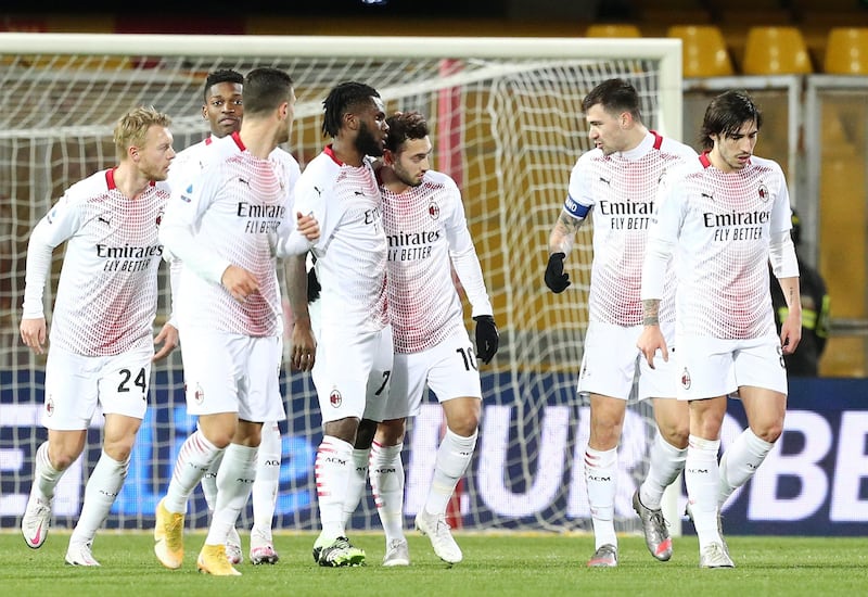 Franck Kessie, centre, celebrates with team mates after scoring AC Milan's first goal in their 2-0 win at Benevento on January 3. Getty