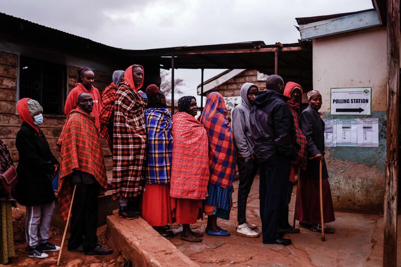 Maasai voters queue to take part in Kenya's general election in Kajiado. AFP
