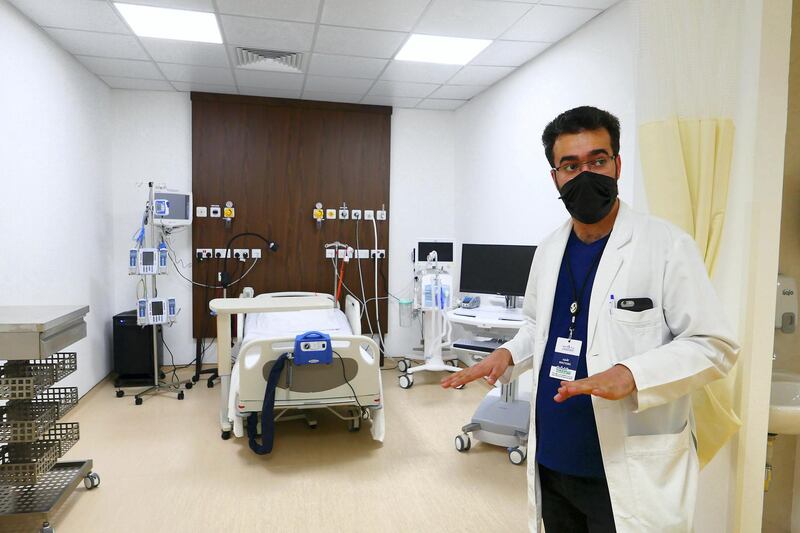 Doctor Mohammad Nour Al Saeed showing the SEHA ICU Center at Dubai Parks and Resorts in Dubai on April 26,2021. (Pawan Singh/The National). Story by Nick Webster