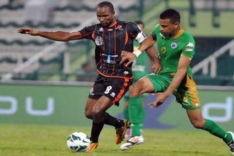 Ajman's confidence for tonight's game stems from the fact that Boris Kabi, left, is in good form. Al Ittihad