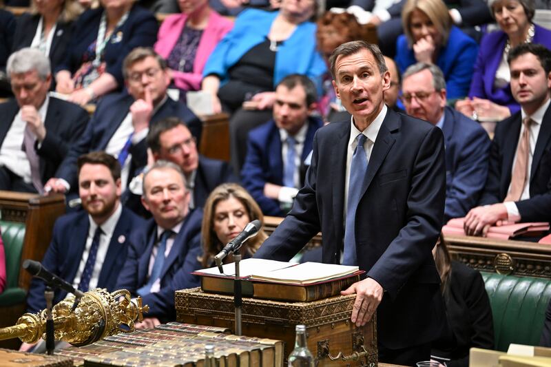 Chancellor of the Exchequer Jeremy Hunt delivers his budget to the House of Commons in London. AP