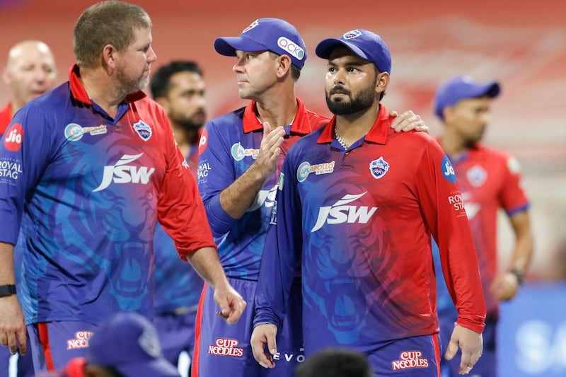 Delhi Capitals captain Rishabh Pant is consoled by coach Ricky Ponting after the defeat to Mumbai Indians at the Wankhede Stadium in Mumbai on Saturday, May 21, 2022. Sportzpics for IPL 