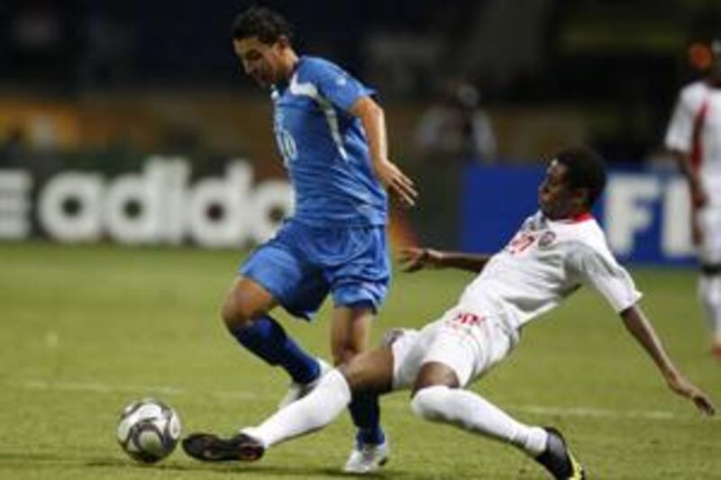 UAE's Abdulaziz Hussain, right, stops Honduras' Erick Andino during their  Fifa Under-20 World Cup match in Egypt.