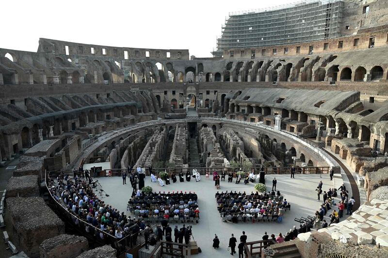 Pope Francis and the Catholicos-Patriarch of the Assyrian Church of the East Mar Awa III attend a prayer for peace in Rome's Colosseum. AFP