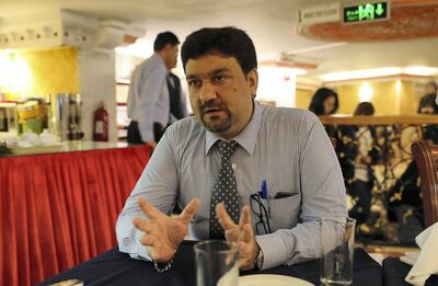 ABU DHABI , UNITED ARAB EMIRATES , February 27 – 2019 :- Adnan Mahmood Butt , restaurant manager from Pakistan during the interview on Pakistan – India conflict at the Al Ibrahimi restaurant in Abu Dhabi. ( Pawan Singh / The National ) For News. Story by John