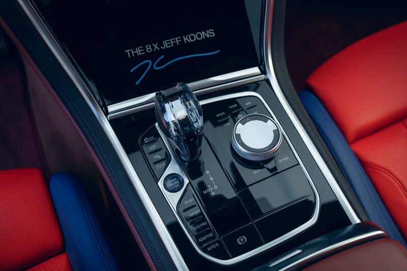 Koons's signature is also above the gear stick.