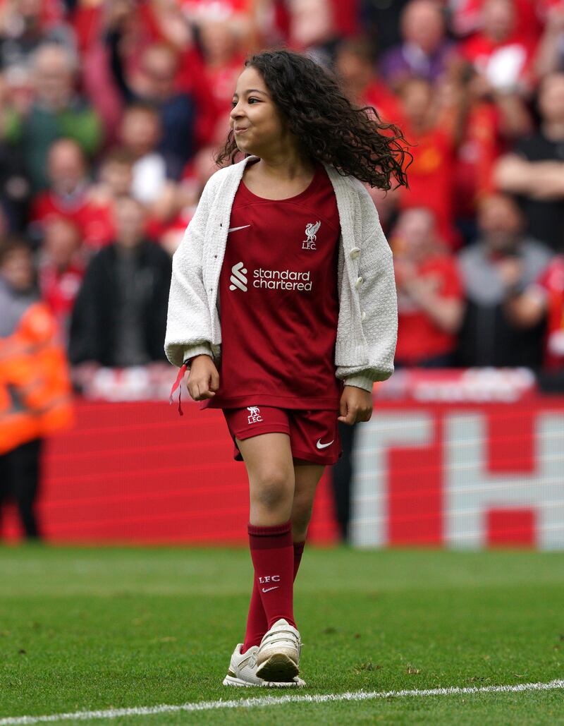 Mohamed Salah's daughter Makka Mohamed Salah on the pitch after the Premier League match against Wolves at Anfield. PA