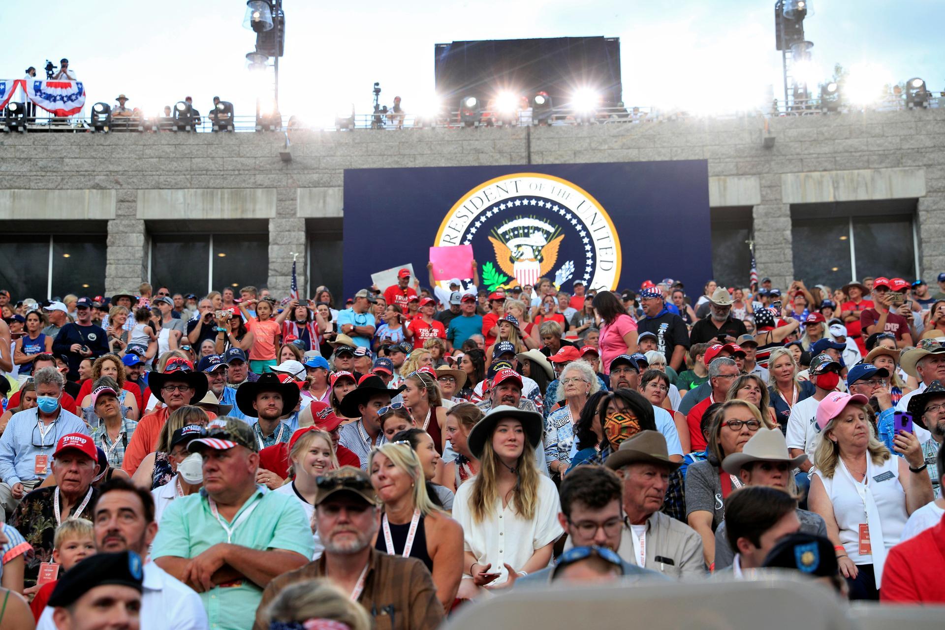 Attendees wait for US President Donald Trump to speak at South Dakota's US Independence Day Mount Rushmore fireworks celebrations. Reuters