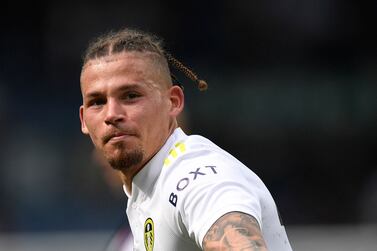 Leeds United's English midfielder Kalvin Phillips gestures to supporters on the pitch after the English Premier League football match between Leeds United and Brighton and Hove Albion at Elland Road in Leeds, northern England on May 15, 2022.  - The game finished 1-1.  (Photo by Oli SCARFF / AFP) / RESTRICTED TO EDITORIAL USE.  No use with unauthorized audio, video, data, fixture lists, club/league logos or 'live' services.  Online in-match use limited to 120 images.  An additional 40 images may be used in extra time.  No video emulation.  Social media in-match use limited to 120 images.  An additional 40 images may be used in extra time.  No use in betting publications, games or single club/league/player publications.   /  