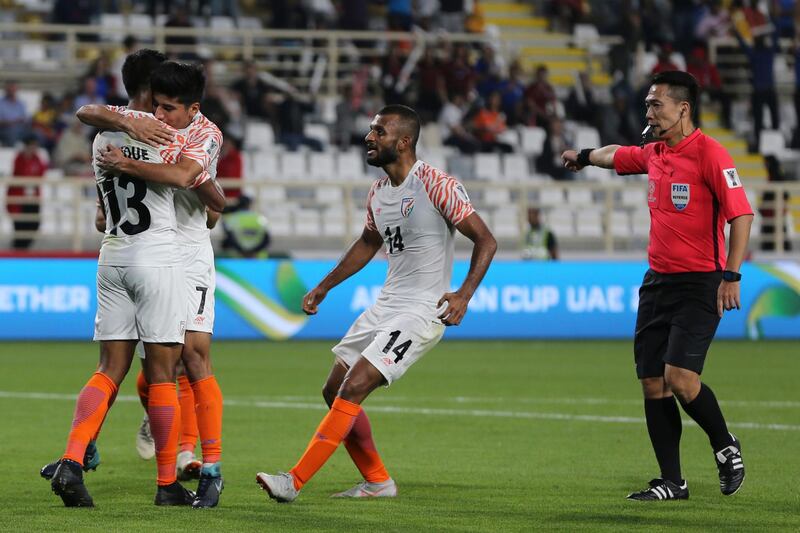 India 's players celebrate a result that puts them close to securing a spot in the last 16. AP Photo