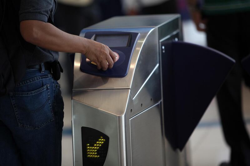 United Arab Emirates - Dubai - November 1, 2010.

NATIONAL: People ride the Metro during the Dubai Roads & Transport Authority's "Public Transport Day" in Dubai on Monday, November 1, 2010. To celebrate, rides on the Metro are free to passengers already carrying Nol cards. Amy Leang