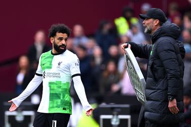 LONDON, ENGLAND - APRIL 27: Mohamed Salah of Liverpool clashes with Jurgen Klopp, Manager of Liverpool, during the Premier League match between West Ham United and Liverpool FC at London Stadium on April 27, 2024 in London, England. (Photo by Justin Setterfield / Getty Images)