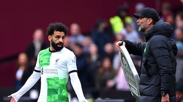 Mohamed Salah, left, and boss Jurgen Klopp argued on the touchline during Saturday's 2-2 draw at West Ham. Getty Images