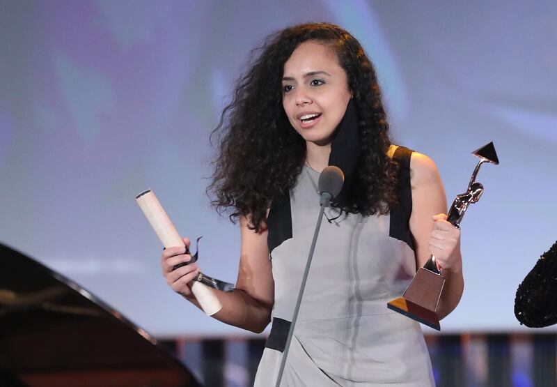 Egyptian film director Mayye Zayed holds the Bronze Pyramid Award for the film Lift like a girl during the closing ceremony of the 42nd  Cairo International Film Festival (CIFF). EPA