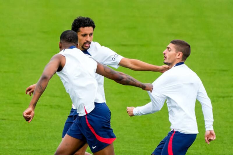 Marquinhos, Presnel Kimpembe and Marco Verratti, right, during Paris Saint-Germain's training session. Getty