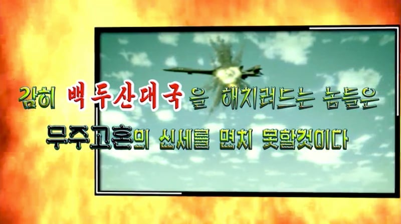 This image made on Tuesday, Sept. 26, 2017, from propaganda video released by North Korea, shows a B-1B bomber hit by a missile. Military analysts say North Korea doesn't have the capability or intent to attack U.S. bombers and fighter jets, despite the country's top diplomat saying it has the right do so. They view the remark by North Korean Foreign Minister Ri Yong Ho and a recent propaganda video simulating such an attack as responses to fiery rhetoric by U.S. President Donald Trump and his hardening stance against the North's nuclear weapons program. Words say "Those who dare try to harm the Great Nation of Mount Paektu would never escape the fate of becoming a wandering ghost." (DPRK Today via AP)