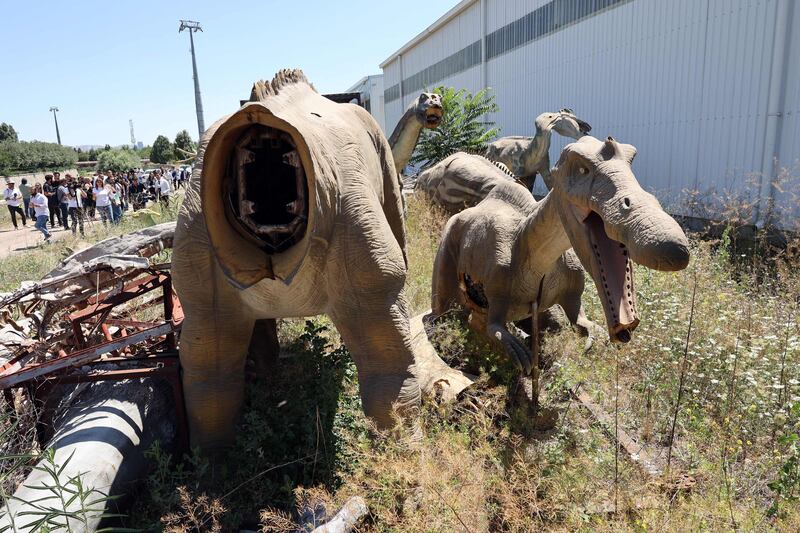 Abandoned dinosaur statues. AFP