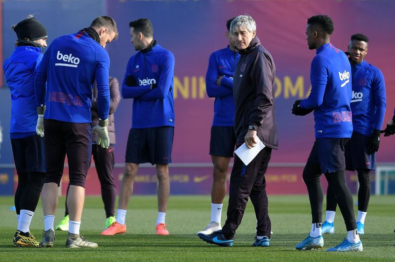 Barcelona manager Quique Setien attends a training session at the Joan Gamper Sports City training ground. AFP