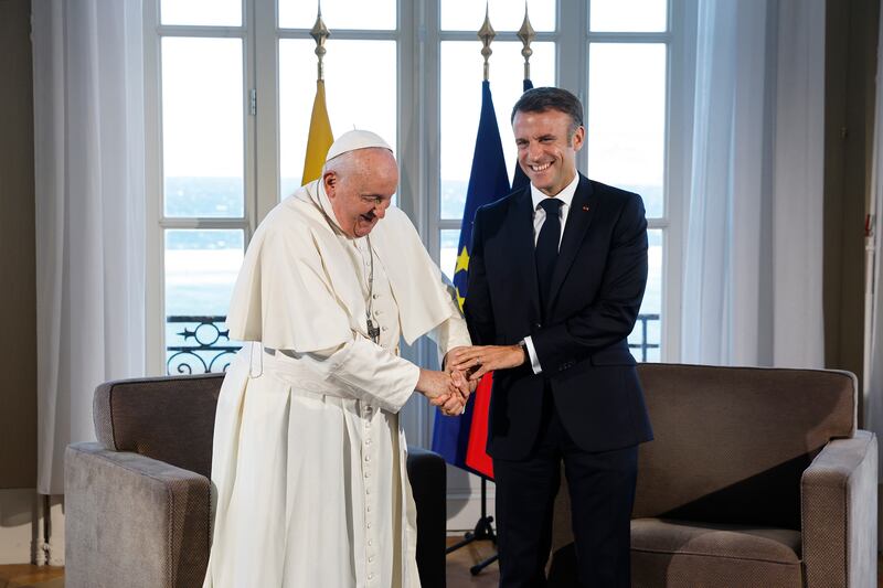 French President Emmanuel Macron meets Pope Francis at the Palais du Pharo. The Pope blasted the "fanaticism of indifference" that greets migrants seeking a better life in Europe. AP
