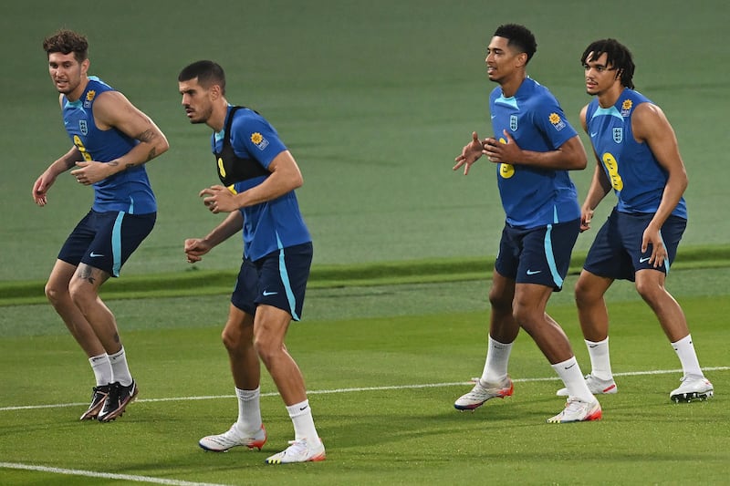 Left to right: John Stones, Conor Coady, Jude Bellingham and Trent Alexander-Arnold. AFP