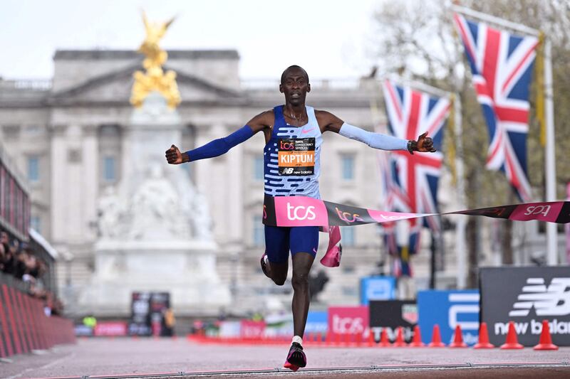 Kenya's Kelvin Kiptum breaks the tape to win the 2023 men's London Marathon on April 23, 2023. Police said Monday that Kiptum and his coach Gervais Hakizimana had died in a car crash in western Kenya that left a third passenger also injured. AFP