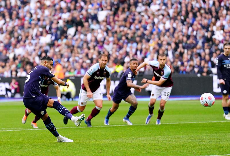 Riyad Mahrez sees his penalty saved as Manchester City draw 2-2 with West Ham United in the Premier League at the London Stadium on Sunday, May 15, 2022. PA