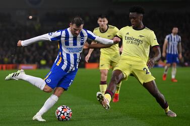 BRIGHTON, ENGLAND - OCTOBER 02: Pascal Gross of Brighton & Hove Albion is challenged by Albert Sambi Lokonga of Arsenal during the Premier League match between Brighton & Hove Albion and Arsenal at American Express Community Stadium on October 02, 2021 in Brighton, England. (Photo by Mike Hewitt / Getty Images)