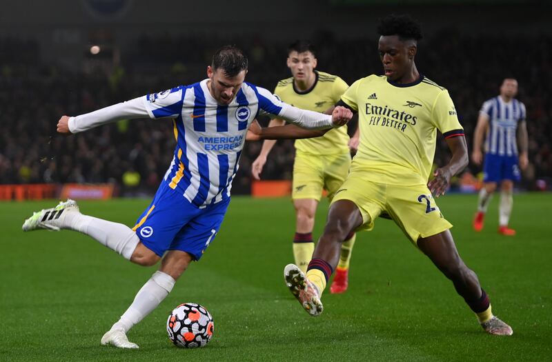 Brighton midfielder Pascal Gross is challenged by Arsenal's Albert Sambi Lokonga during the Premier League match at the Amex Stadium. Getty Images