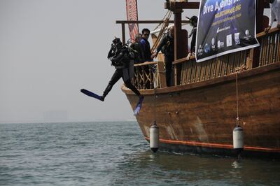 A diver starting their clean-up dive. Courtesy Hilton Al Hamra Beach