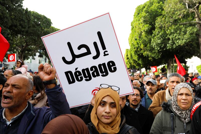 Supporters of opposition groups march in the Tunisian  capital, Tunis. Reuters