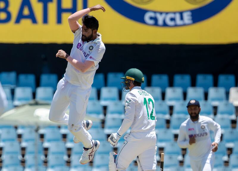 India pacer Mohammed Siraj leaps as he celebrates after bowling South Africa's batsman Quinton de Kock. AP