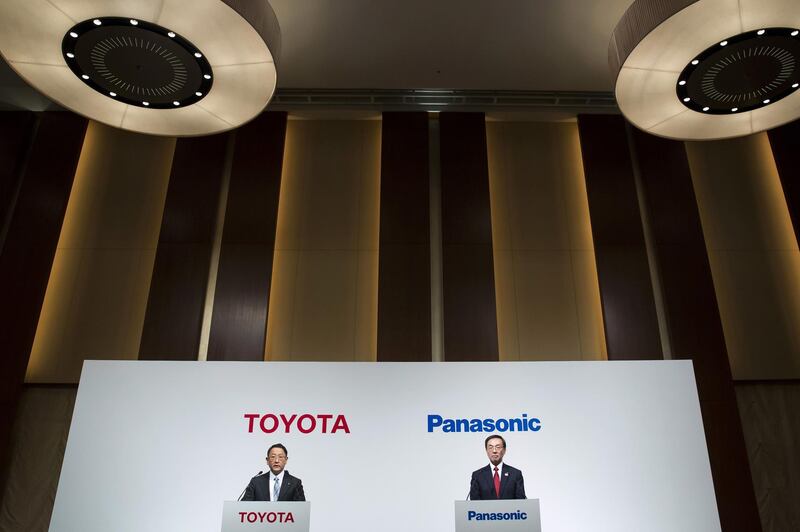 Akio Toyoda, president of Toyota Motor Corp., left, and Kazuhiro Tsuga, president of Panasonic Corp., attend a joint news conference in Tokyo, Japan, on Wednesday, Dec. 13, 2017. Toyota and Panasonic, the world’s largest supplier of electric-car batteries, are exploring a joint business to develop power equipment for zero-emission vehicles as governments and the global automobile industry move to tackle pollution. Photographer: Tomohiro Ohsumi/Bloomberg