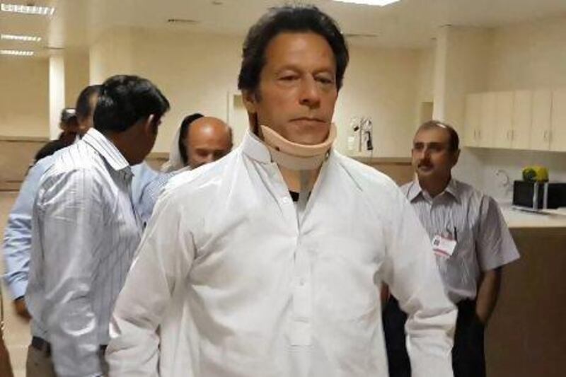 Imran Khan left hospital a fortnight after sustaining serious back injuries in a fall from a forklift at a campaign event.