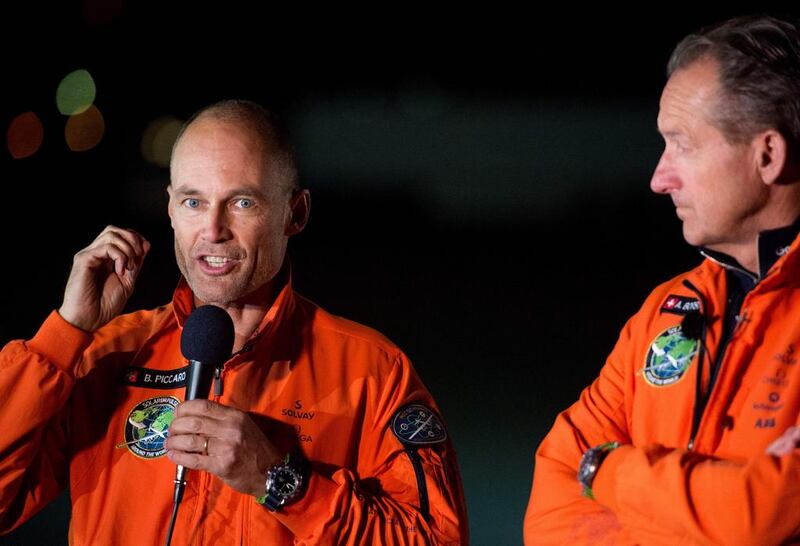 Bertrand Piccard, left, and Andre Borschberg address a crowd after 'Solar Impulse 2' landed at Mountain View, California on April 23, 2016.