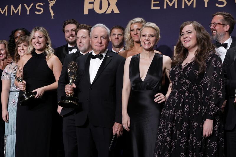 FILE PHOTO: 71st Primetime Emmy Awards - Photo Room – Los Angeles, California, U.S., September 22, 2019 - The cast of Saturday Night Live poses backstage with their award for Outstanding Variety Sketch Series. REUTERS/Monica Almeida/File Photo