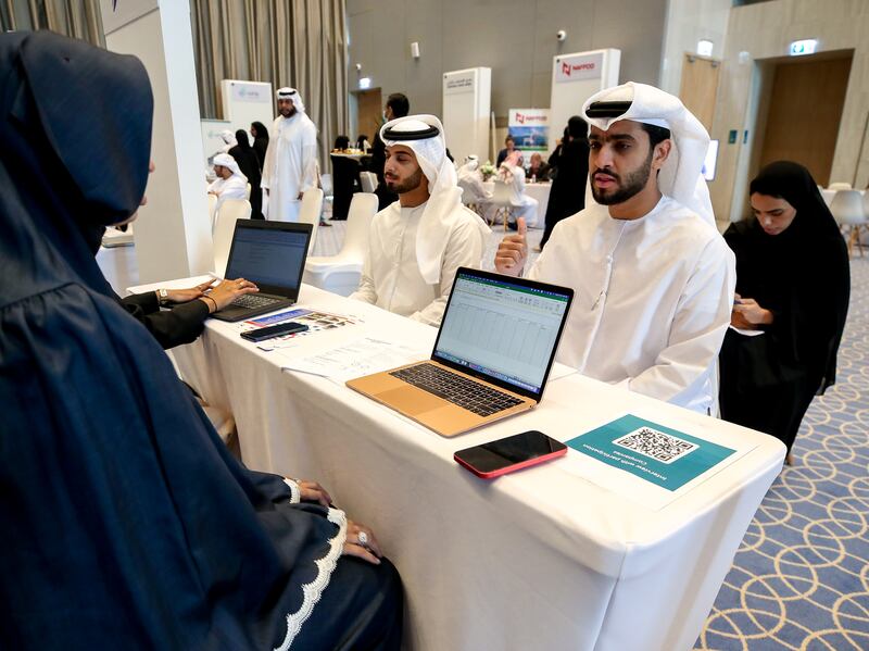 Emiratis take part in the UAE Industrialist Career Fair held in Abu Dhabi in October. Victor Besa / The National