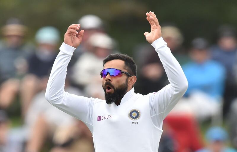India's captain Virat Kohli reacts as he bowls on day three of the second Test cricket match between New Zealand and India at the Hagley Oval in Christchurch on March 2, 2020. / AFP / PETER PARKS
