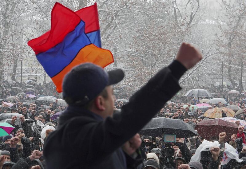 People attend an opposition rally to demand the resignation of Prime Minister Nikol Pashinyan in Yerevan. REUTERS
