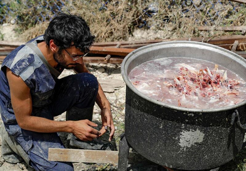 Mr Okdjian prepares food every day for the animals. AFP