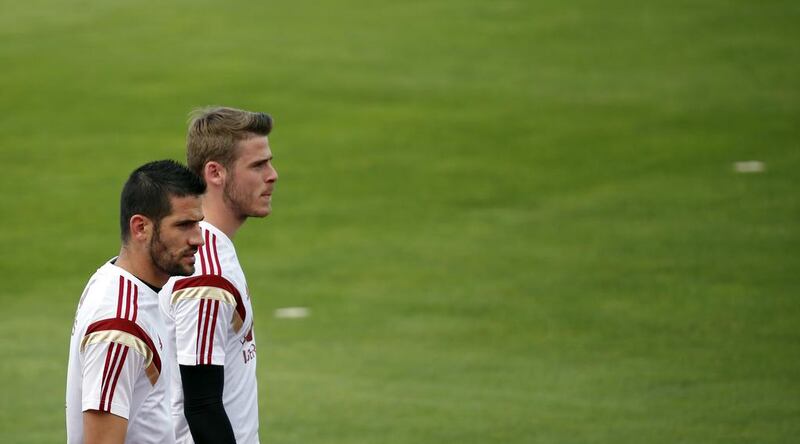 Kiko Casilla, left, and David de Gea are two of the three goalkeepers in Spain’s 23-man squad to face Germany in an international friendly on Tuesday night. Susana Vera / Reuters