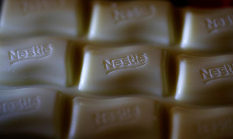 FILE PHOTO: A Nestle company logo is pictured on a bar of Milky Bar chocolate in Manchester, Britain April 25, 2017. REUTERS/Phil Noble/File Photo