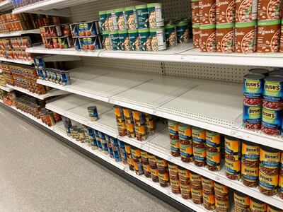 Shelves sit devoid of products in a Target store in Sheridan, Colorado. AP