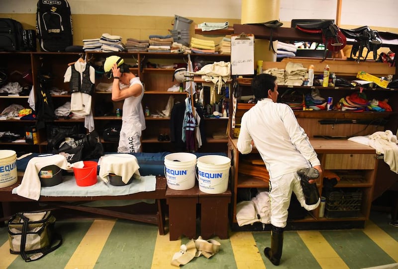 A jockey prepares for the fourth race prior to the 139th running of the Preakness Stakes at Pimlico Race Course on Saturday. Patrick Smith / Getty Images / AFP / May 17, 2014