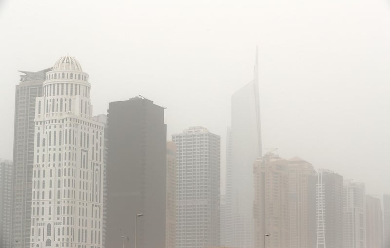 DUBAI , UNITED ARAB EMIRATES , JULY 30 – 2018 :- View of the residential and office towers during the dusty and hot weather in Jumeirah Lake Towers in Dubai. ( Pawan Singh / The National )  For News.