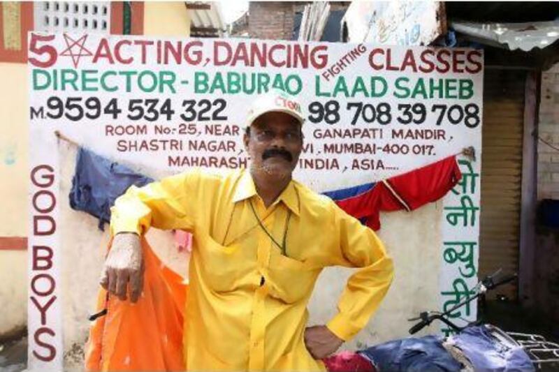 Baburao Ladsaheb teaches acting dancing fighting and modeling in his one-room flat in a Mumbai slum.