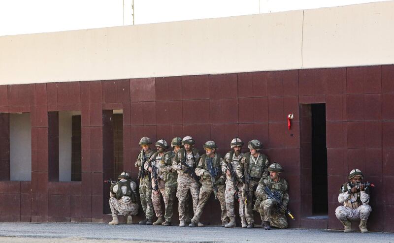 Kuwaiti and British soldiers take part in the Exercise Desert Warrior, attended by Prince William, Duke of Cambridge (unseen), at Sheikh Salem al-Ali al-Sabah Camp, about 40 kilometres north of Kuwait City.  AFP